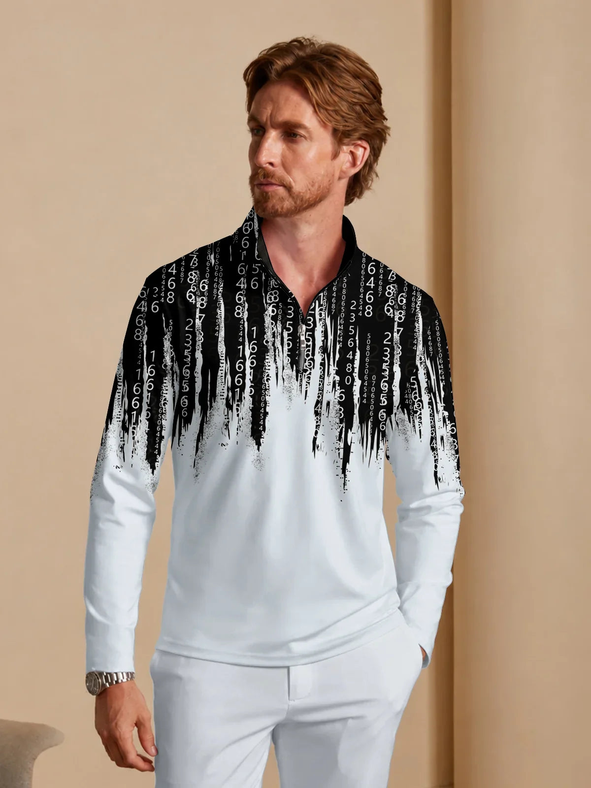 Man wearing a performance golf polo with a black and white binary code drip print.